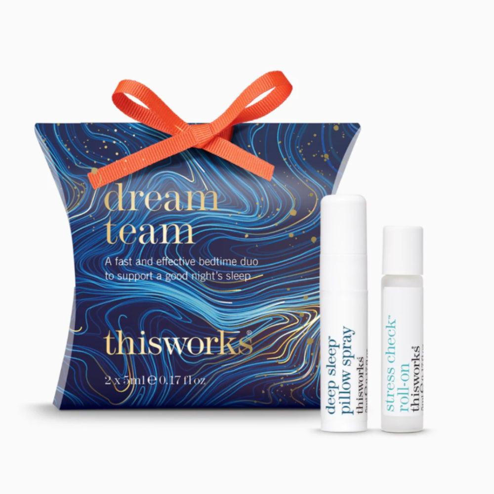 thisworks dream team product set with blue packaging and orange ribbon on a white background