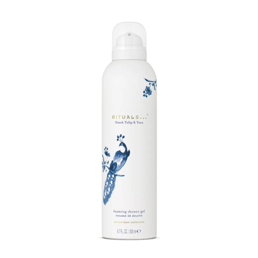 A white canister of Rituals Shower Gel, featuring blue peacock illustrations and gold lettering, set against a plain white background.