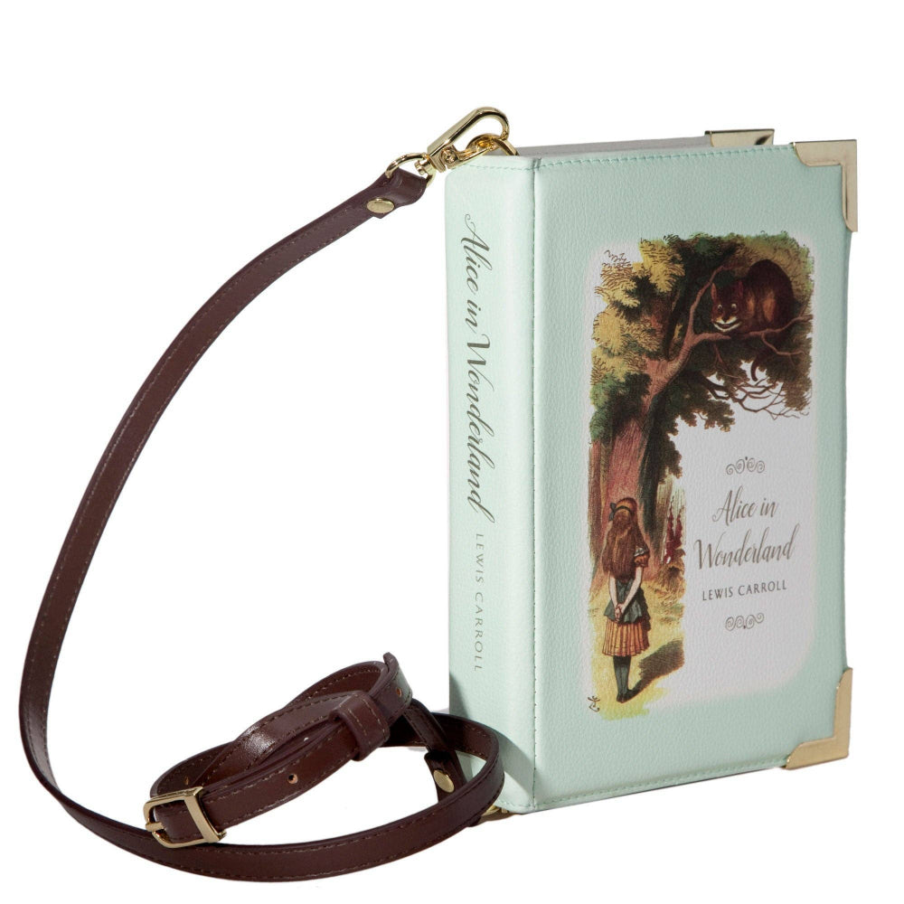 Book-shaped handbag with 'Alice in Wonderland' design on a white background