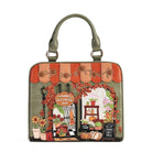 An olive green handbag with a detailed autumn-themed embroidered design depicting a flower shop storefront, pumpkins, sunflowers, and a scalloped awning in orange and peach tones.