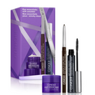 Clinique Eye Essentials gift set featuring a purple box, a purple smart clinical repair cream jar, a brown eyeliner pencil, and a black mascara tube with wand, arranged on a white background.