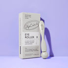 UpCircle eye roller with packaging on a purple background
