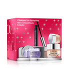 Clinique beauty set with products on a pink and silver box