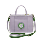 Purple handbag with green accents and a logo on a white background