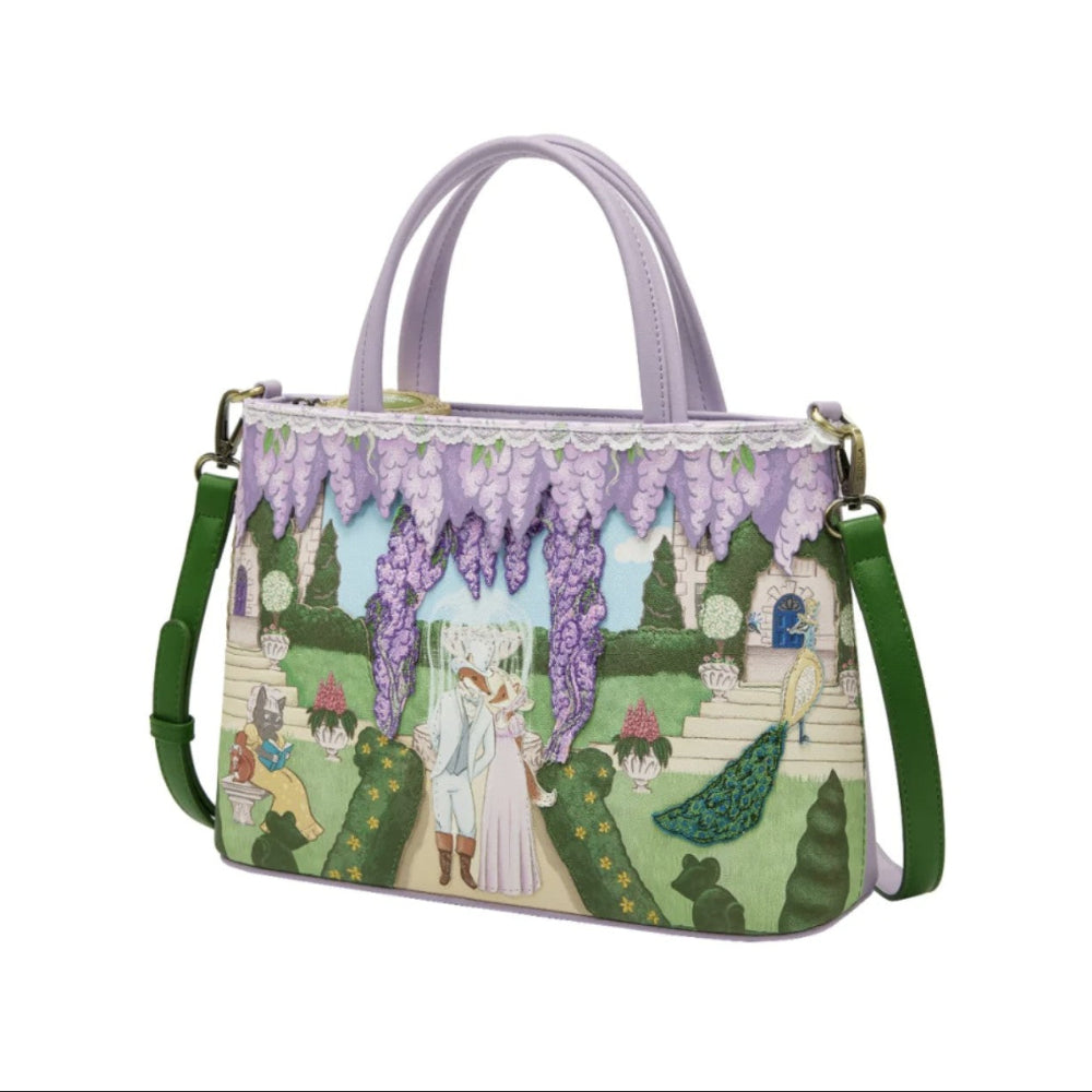 Handbag with fairy tale design featuring a castle and characters, on a white background