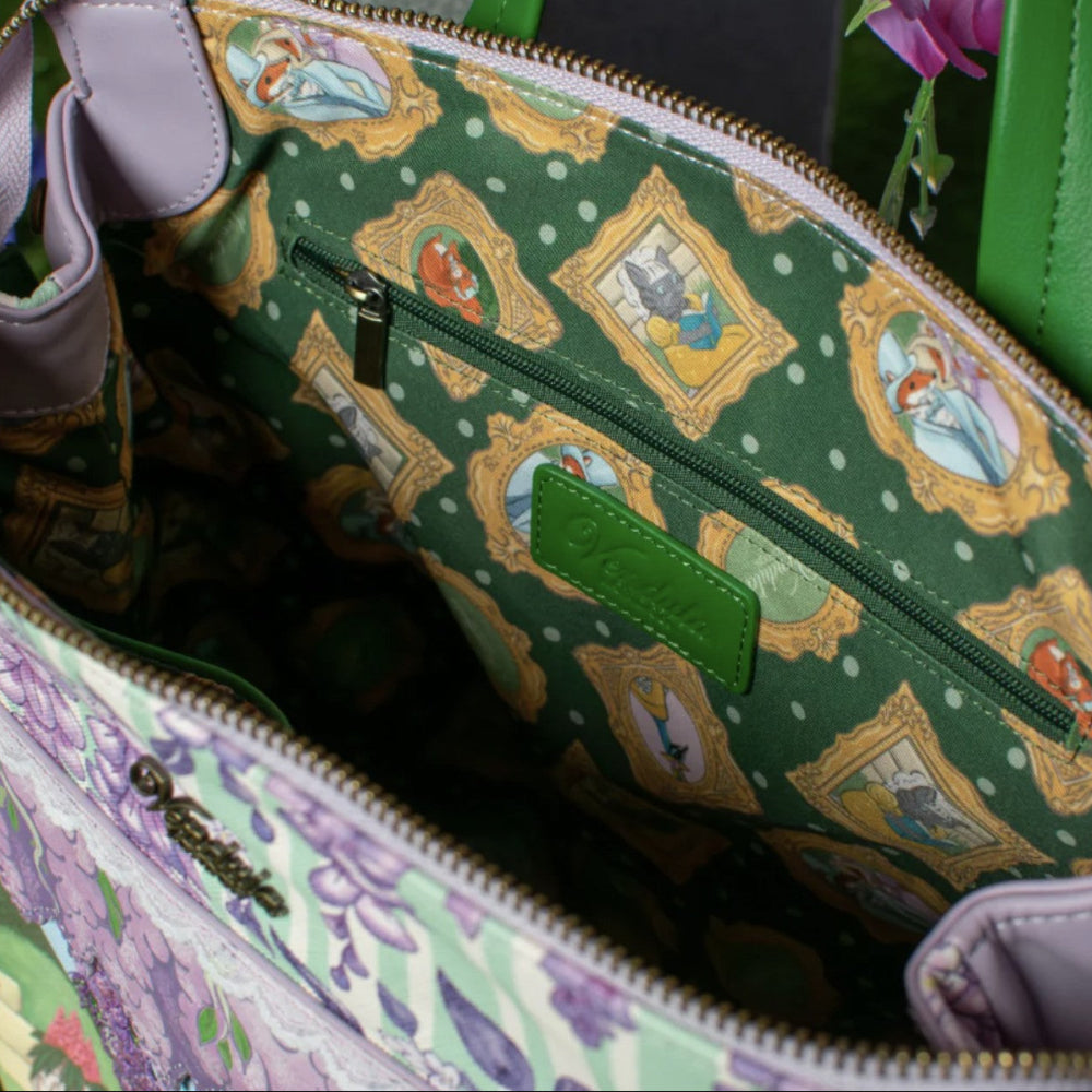 Green bag with animated character pattern, featuring a visible Vendula logo.