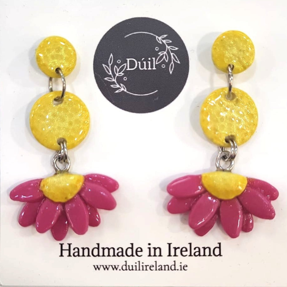 Pair of yellow and pink floral earrings on a Daili Ireland branded card.