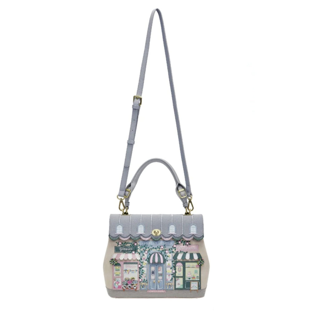 Handbag with a design of buildings on a white background