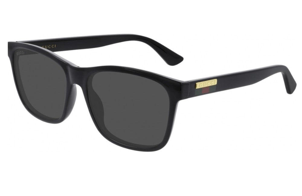 Black sunglasses with a gold logo on a white background