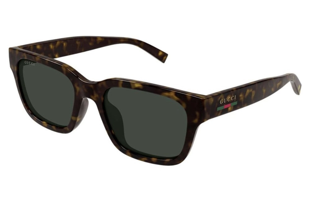 Sunglasses with tortoiseshell frame and dark lenses on a white background