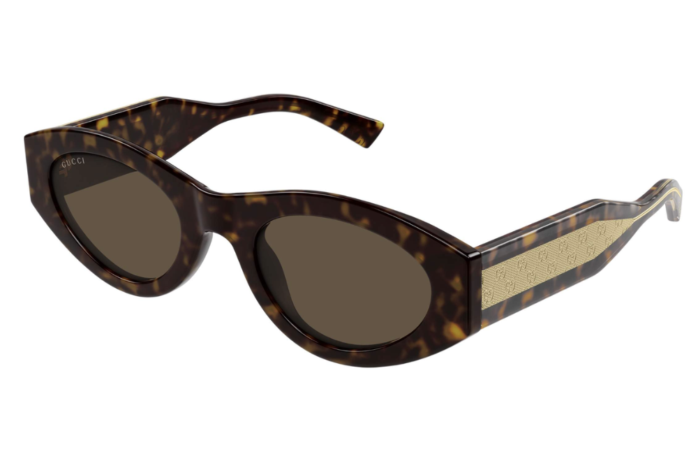 Sunglasses with tortoiseshell frame and beige lens on a white background