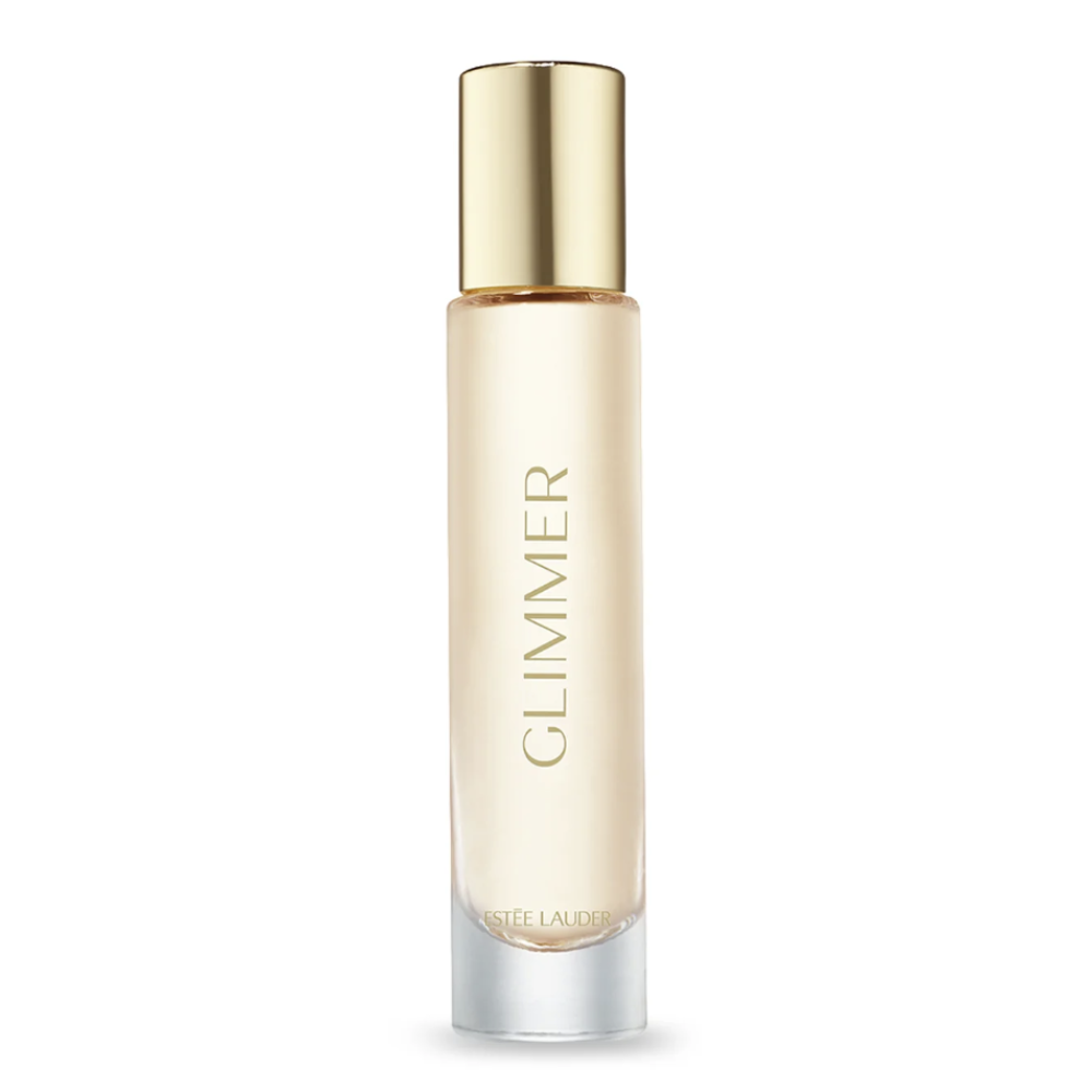 Estée Lauder Glimmer liquid cosmetic bottle with a reflective gold cap and pale gold liquid inside, set against a clean white background.