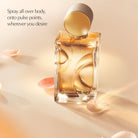 Estee Lauder Glimmer Eau de Parfum bottle with a gold cap.
