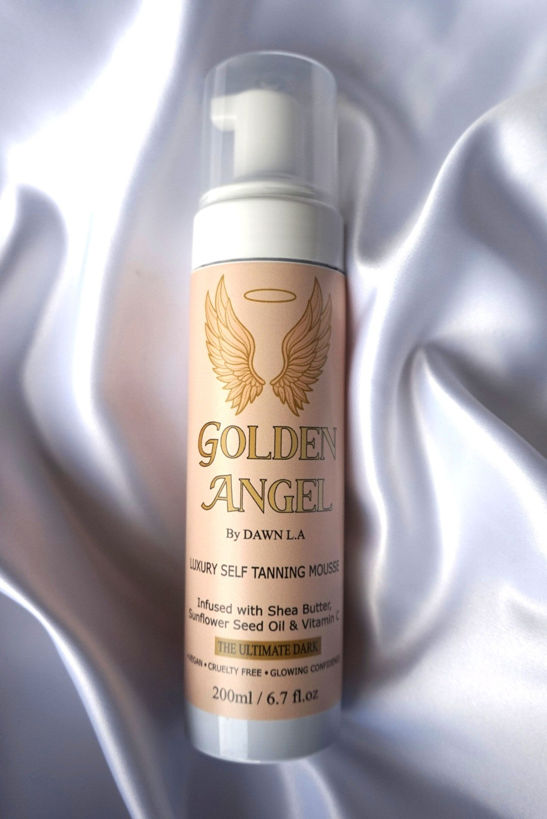 A bottle of Golden Angel Luxury Self Tanning Mousse by Dawn LA