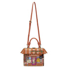 Handbag designed like a small house with a striped roof on a white background