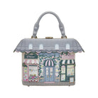Handbag designed with shop fronts on a white background