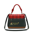 A colour-blocked handbag with a red top handle and flap, a dark green main body, a brown base, and a dark green shoulder strap. The back features a small embroidered chicken graphic and the text 'Silly Goose? I'd rather be chuckling fabulous!'.