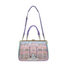 Handbag with a building design and purple strap on a white background
