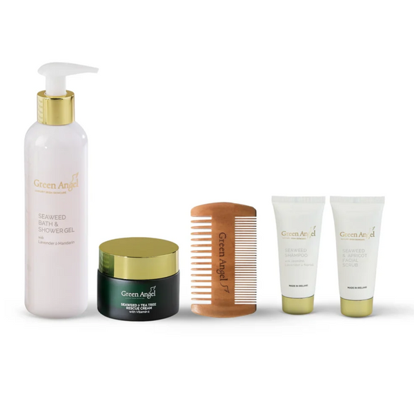 Set of Green Angel hair care products including bottles, a jar, and a comb on a white background