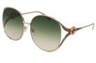 Gold-framed sunglasses with green gradient lenses on a white background