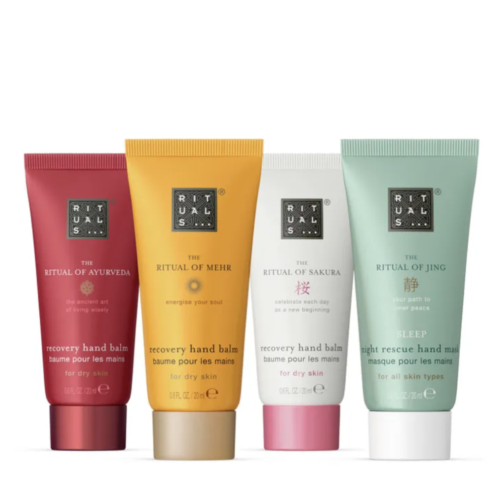 Four Rituals hand balm tubes in different colors (red, yellow, pink, and green) arranged in a row on a white background.