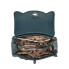 An open teal blue leather handbag with a cat-ear shaped top, showing a patterned beige interior lining with cartoon illustrations and multiple zip compartments.