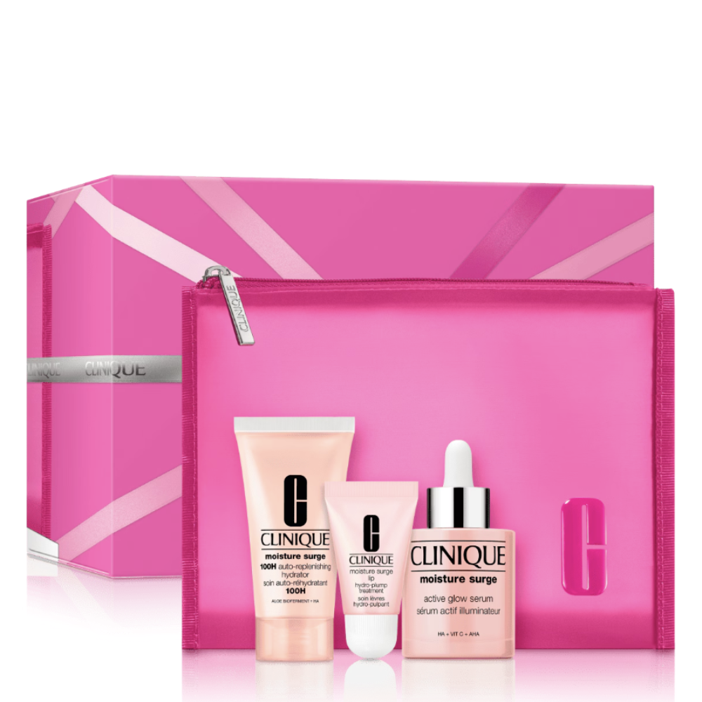 Clinique Moisture Surge gift set with a large pink presentation box, a matching zip pouch, and three skincare bottles in front on a white background.