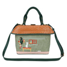 Handbag with cat design and brown top section on a white background