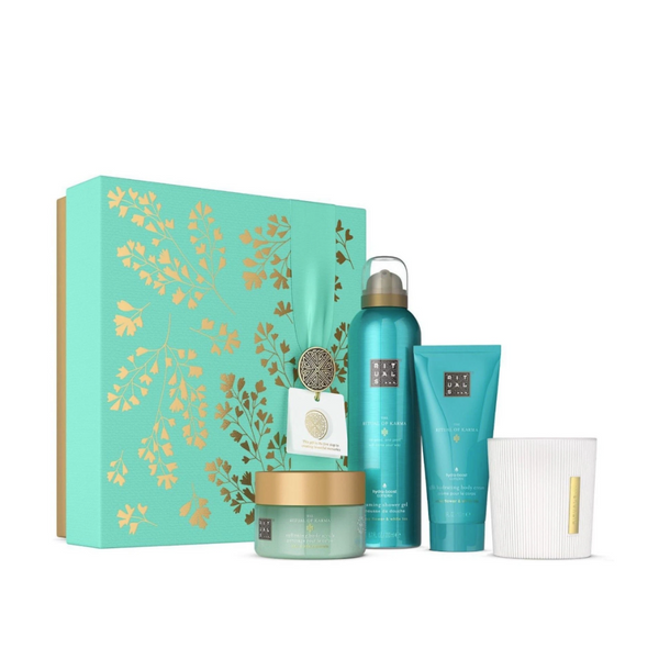 Set of skincare products with a decorative box on a white background