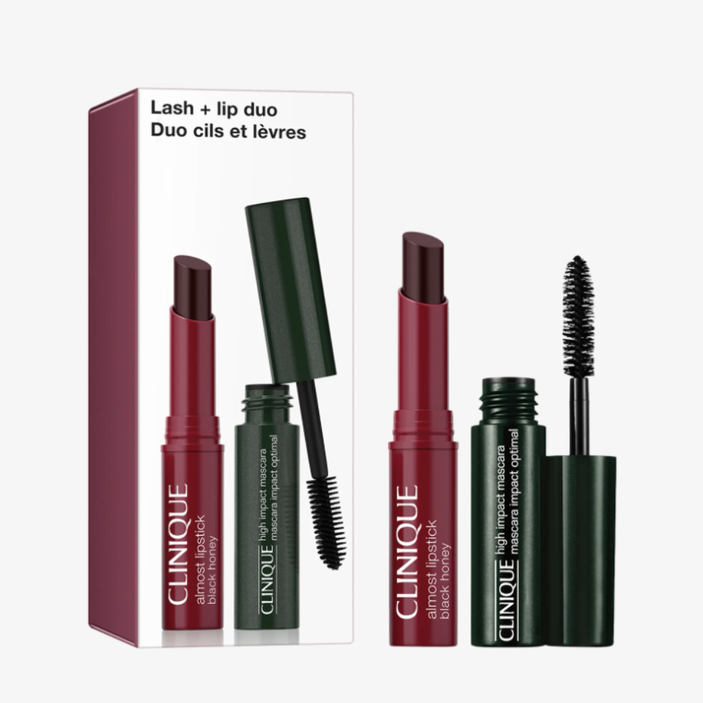 Clinique Lash + Lip Duo mascara set shown with its retail box and two individual tubes: a deep berry-red mascara and a dark forest green mascara, both with caps off and wands visible, on a light gray background.