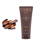 Tube of Vita Liberata The Lotion with a sample on a light gray background