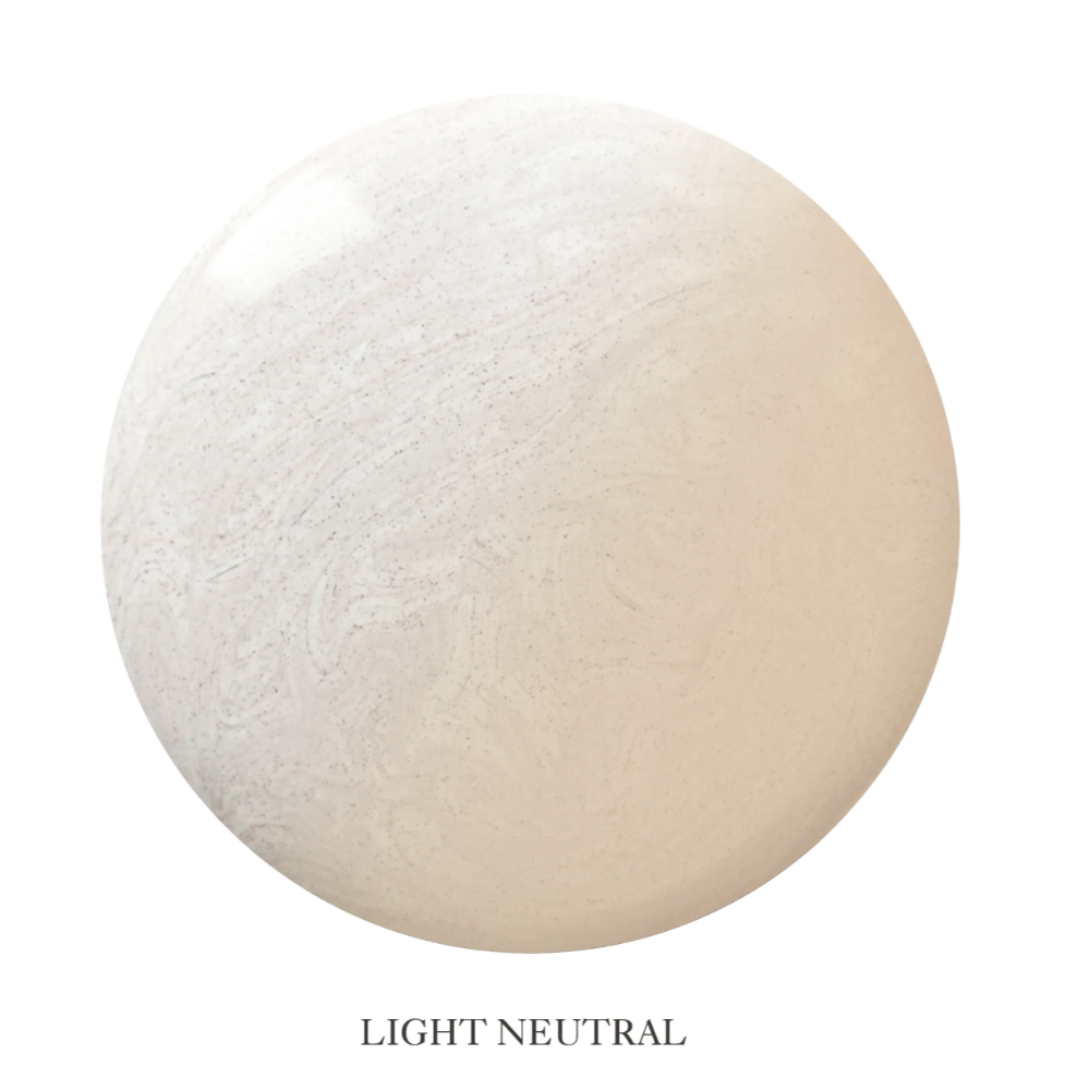 A circular color swatch labeled 'FAIR' at the bottom, showing a very light warm off-white to pale beige tone with subtle marbling on a white background.