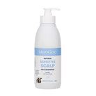 A white bottle of MooGoo Natural Sensitive Scalp Milk Shampoo