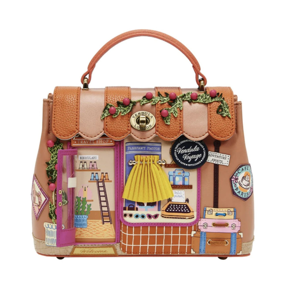 Decorative handbag with miniature scenes and details on a white background