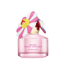 Pink perfume bottle with floral design on a white background