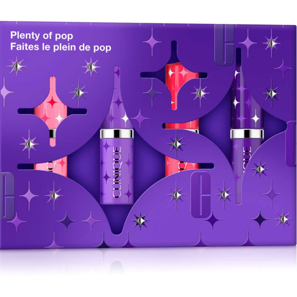 Purple makeup set packaging with lip products on a white background