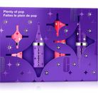 Purple makeup set packaging with lip products on a white background