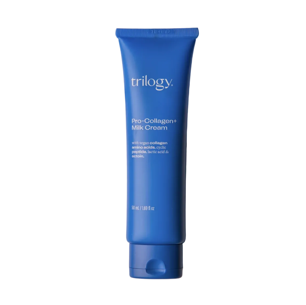 Blue tube of Trilogy Pro-Collagen Milk Cream on a beige background