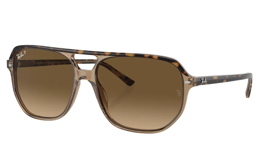 Sunglasses with tortoiseshell frame and brown lenses on a white background