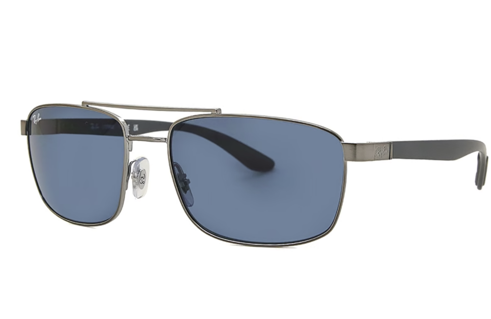 Sunglasses with blue lenses and silver frame on a white background