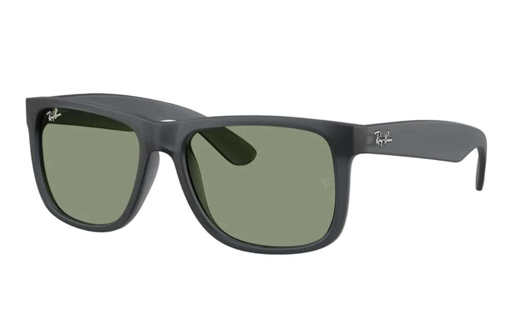 Black sunglasses with green lenses on a white background