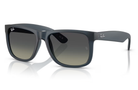 Gray sunglasses with a reflective surface on a white background