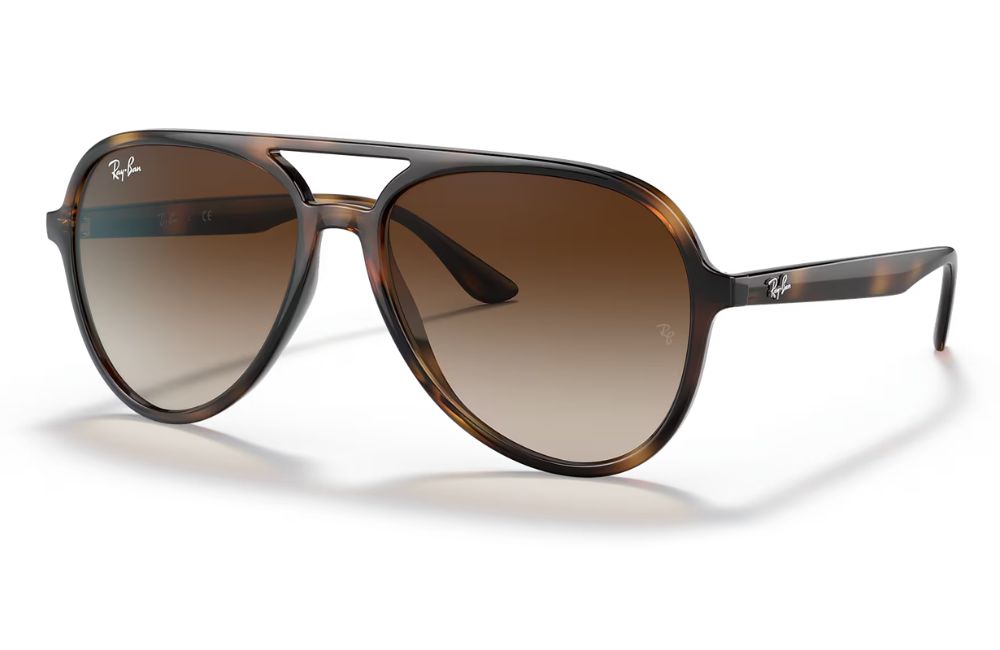 Brown sunglasses with tortoiseshell frame on a white background