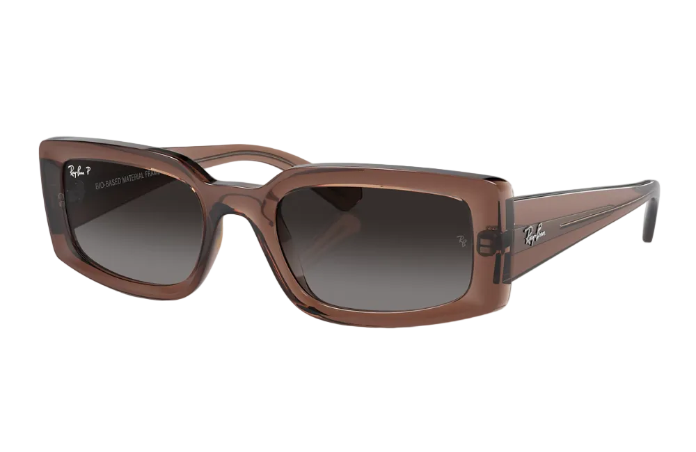 Brown sunglasses with a reflective surface on a white background