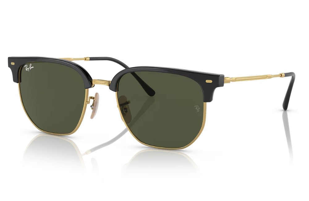 Ray-Ban Clubmaster sunglasses with a black acetate front, gold metal rims and bridge, and dark green lenses.