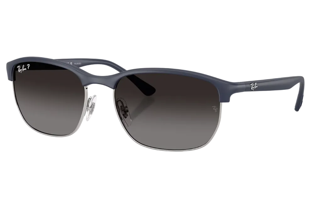Sunglasses with dark blue frames and gradient lenses on a white background