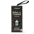 Tisserand Relax & Unwind Diffuser Oil packaging box in black with gold star details, featuring a black hanging loop at the top, on a white background.