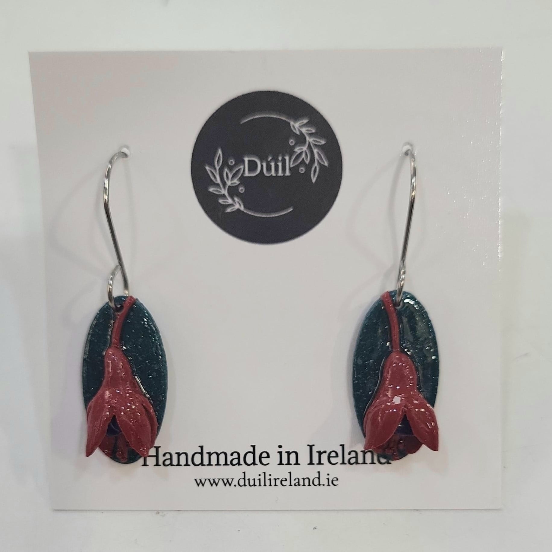 Pair of earrings on a Dúil branded card with 'Handmade in Ireland' text.