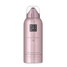 A bottle of Rituals The Ritual of Sakura body lotion in a metallic pink bottle with a clear cap, centered on a white background.