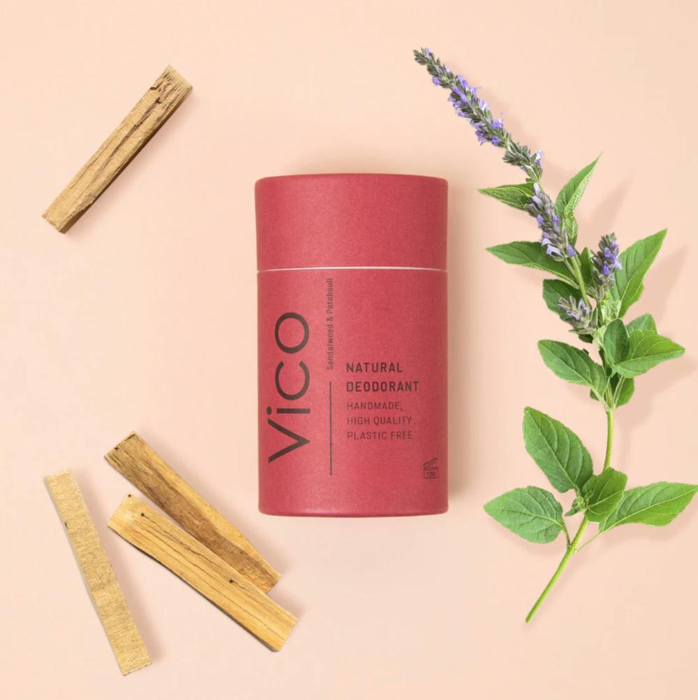 Vico natural deodorant canister with wooden sticks and lavender on a beige background